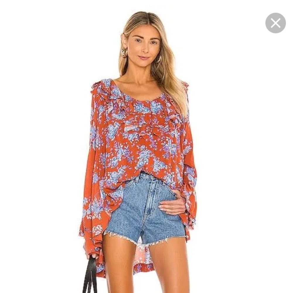 Used. Excellent condition.  Free People Lorretta Floral Viscose Tunic Size M